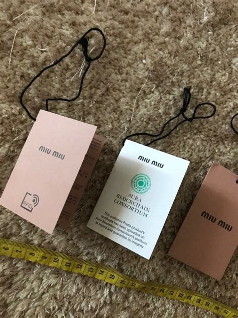 miu miu label tag